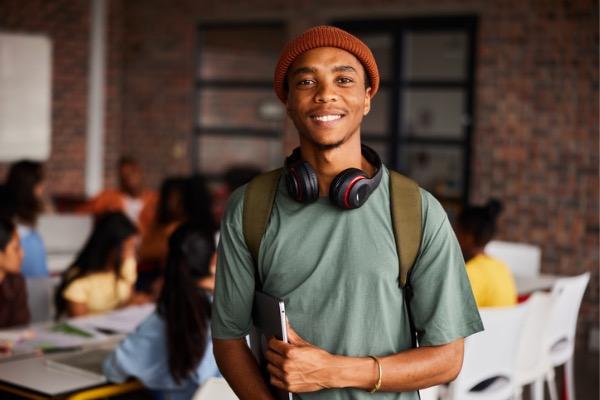 Kid at school smiling in camera 